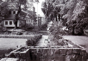 Reimersholme - view to a house through a garden above stone stairs