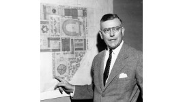 Paul Thiry stands in front of plans for the Seattle Center