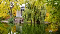 Pond with mausoleum and surrounding trees
