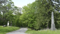 Path in the center; grave markers on either side