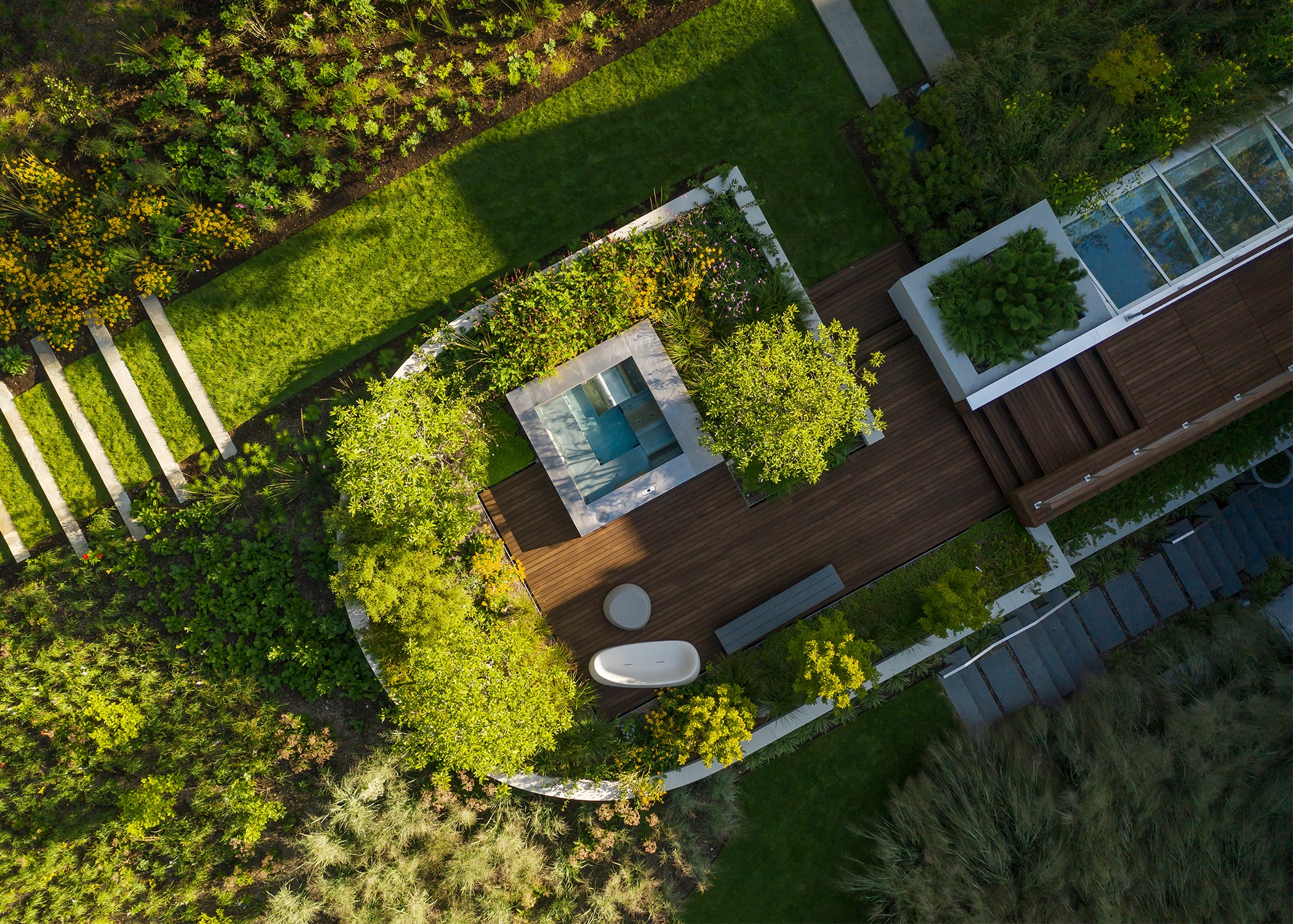 Aerial view of the lawn and spa hot tub at Tango House, Greenwich, CT