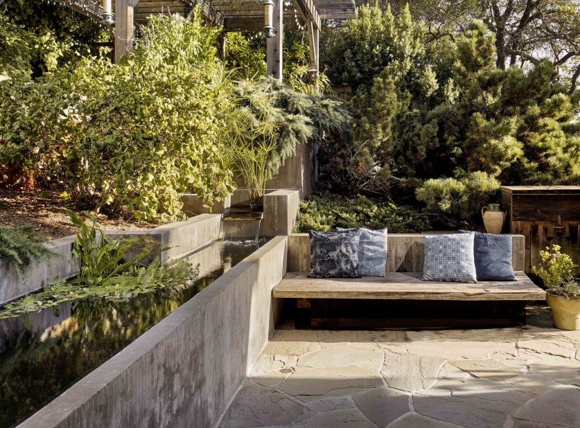 Bench seating along a retaining wall. 