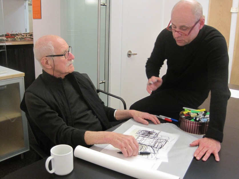 Paul Friedberg talking with another man.