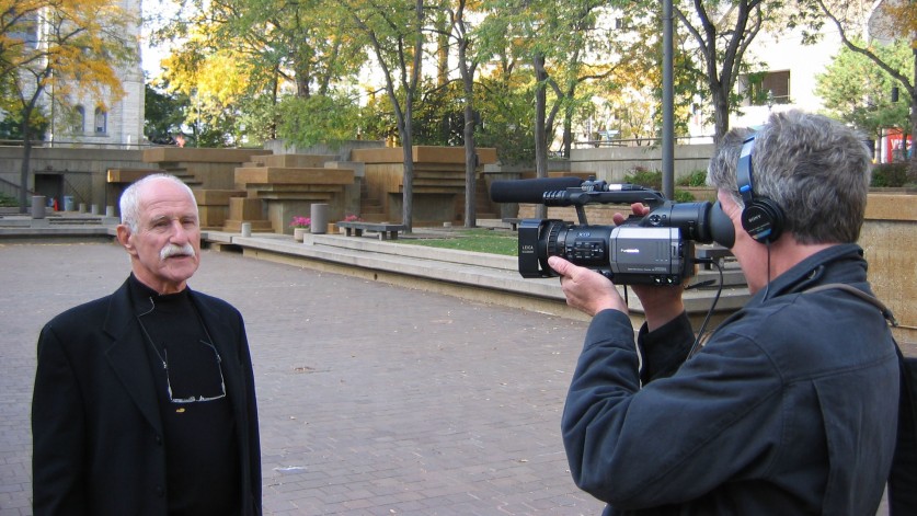 Man videotaping Paul Friedberg.