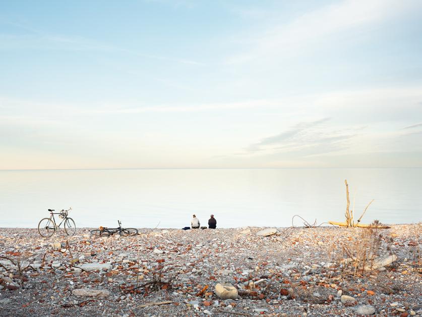 Cyclists on the shoreline of the Endikement, Tommy Thompson Park, Toronto, 2020