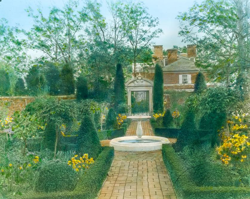 Tregaron_FourSquareGarden_FrancesBenjaminJohnston_LOC.jpg View from the formal walled garden looking toward the estate house